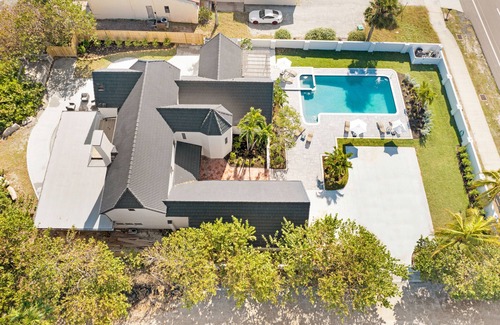 Cocoa Beach House | Beach Front Home with Gated entry Large sparkling pool and private beach access