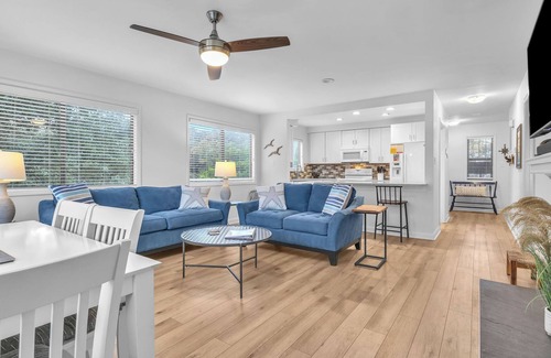 Caswell Beach Condo | Beach Getaway Among the Oaks: Community Pools, Short Walk to Beach Access