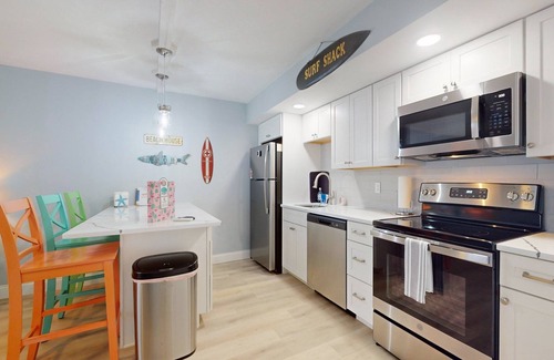 New Smyrna Beach Condo | Beach Hideaway NSB- Steps to the beach