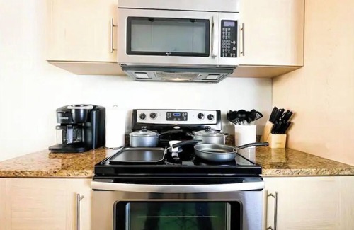 South Padre Island Condo | Beach Side - Heated Pool Paradise w/BBQ Grill