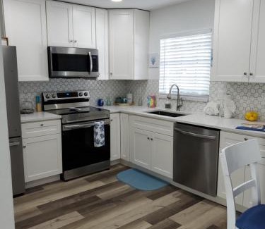 Fort Myers Beach House | Beach Style lake view home with boat parking & minutes to the best beaches!