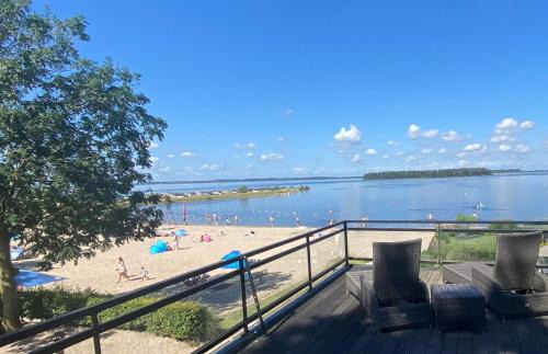 Hulshorst Villa | BEACH VILLA in erster Reihe - direkter Strandzugang - eingezäunter Garten - Dachterrasse - 2 Gartenterrassen - Terrassendach - Grill mit Plancha - XXL Meerblick - Bar - SONOS Soundanlage - Pool Whirlpool - kinderfreundlich - Hunde willkommen