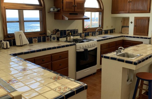 Los Zacatitos House | Beachfront property - swimmable beach — accommodates from 2 to 12 people.