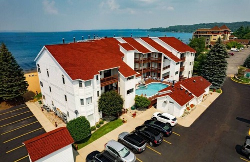 Traverse City Condo | Beachfront Serenity 101|Direct Beach Access |Near Downtown + Tart Trail