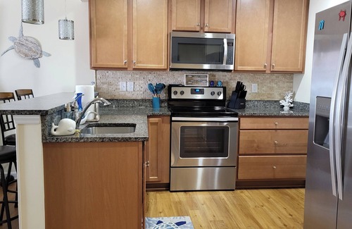 North Topsail Beach House | Beachfront townhome, private beach access, outdoor space & amenities.