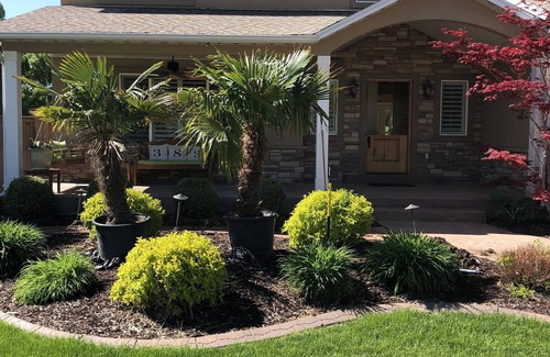 River Bottoms House | Beachy Home in Provo. Large deck with builtin hot tub, Fire pit, Palapa