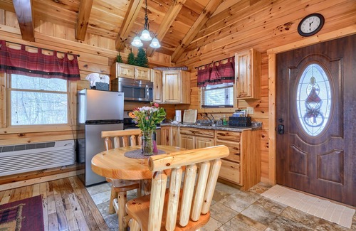 Carbon Hill Cabin | Bear Hugs cabin nestled in the woods.