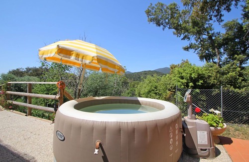 Castiglione della Pescaia House | Beautiful private villa with hot tub, A/C, TV, veranda, pets allowed, panoramic view and parking