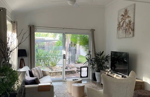 Sandstone Point House | Beautiful 3 bed home, tropical pool and garden, Sandstone Point. Dog Friendly!