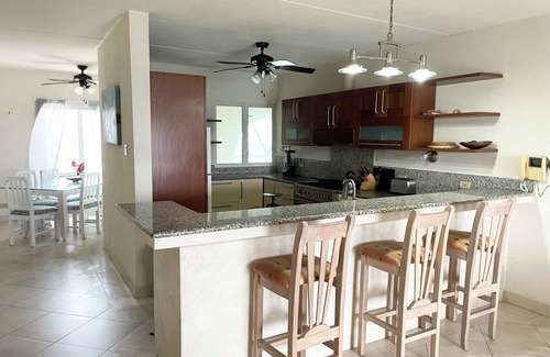 Atlantic Shores Villa | Beautiful, airy 3 bedroom second-floor unit with views of the ocean and pool.