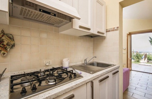 Fornole Apartment | Beautiful apartment for 4 guests with A/C, WIFI, pool, TV, veranda and parking