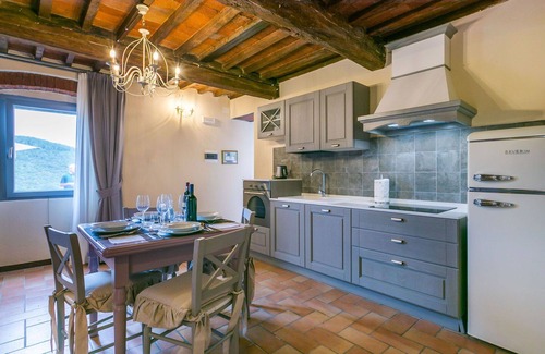 Castagneto Carducci Villa | Beautiful apartment in villa for 4 guests with A/C, pool, WIFI, TV, patio and pets allowed
