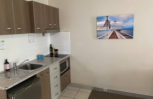 North Ward Apartment | Beautiful Beach Front location with sea views and breeze and private courtyard.