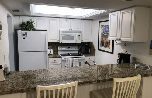 Sanibel Condo | Beautiful Beach Front Complex - Private Walkway To The Beach - Pool View