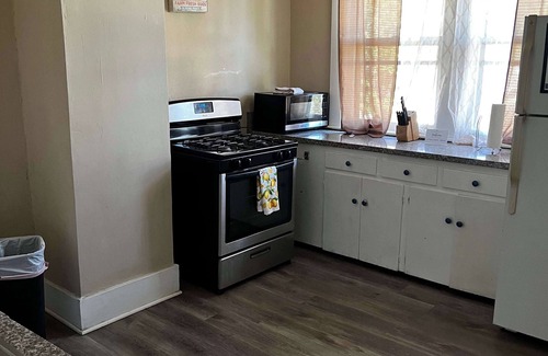 Midtown House | Beautiful Brick Patio, Top Unit- Bluemoon Bungalow