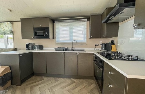 Saxmundham House | Beautiful caravan with decking at Carlton Meres Park, Suffolk ref 60009CL