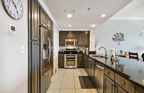 Thomas Drive Condo | Beautiful condo with gulf view & shared pool and hot tub Spring/summer open!