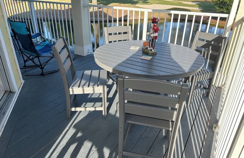 Calabash Condo | Beautiful condo overlooking the 8th hole on Magnolia course,lagoon with turtles.