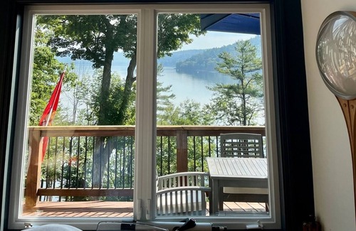 Hadley House | Beautiful Great Sacandaga lakefront home. Sleeps 8+. 96' private beach & dock.
