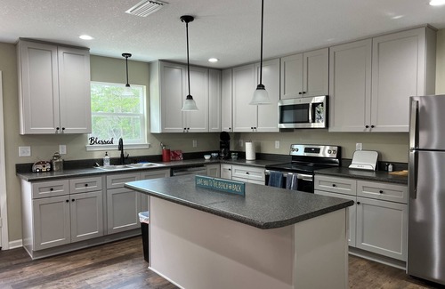 Washington County House | Beautiful home, 200 Private Acres on a lake! Fishing and Springs nearby!