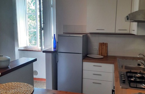 Rosignano Marittimo Villa | Beautiful apartment in villa for 10 guests with pool, TV, pets allowed and parking