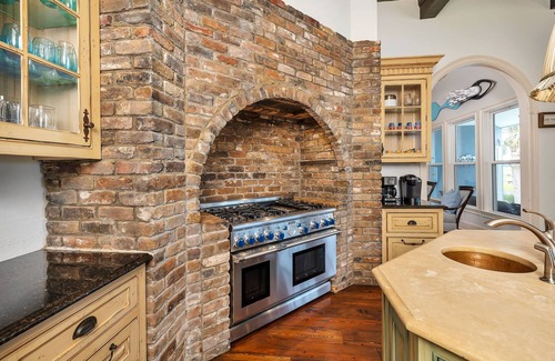 East Beach House | Beautiful Large Home with Pool, Riverfront Dock, Gourmet Kitchen and Kids' Bunk Room.