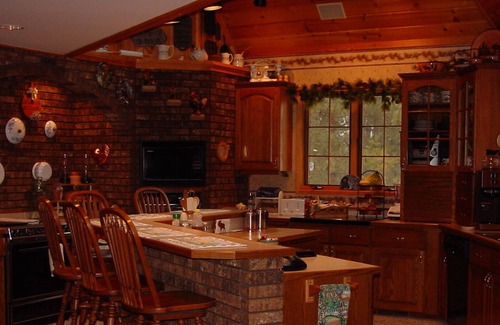 Charlevoix Bed & Breakfast | Beautiful, log home with 6 individual rooms to choose from.