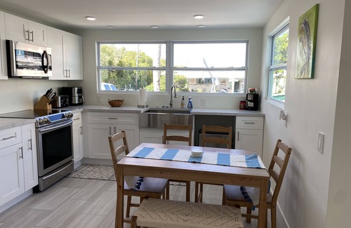 Key Largo Village House | Beautiful Remodeled Home on the Water! 40 ft dock & short walk to private beach!