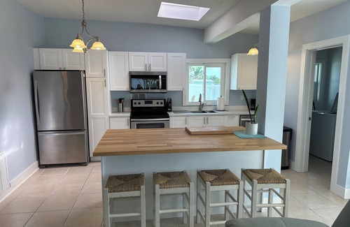 Port Charlotte - Charlotte Harbor House | Beautiful waterfront home, heated pool, bbq, dock, close to beaches, restaurant