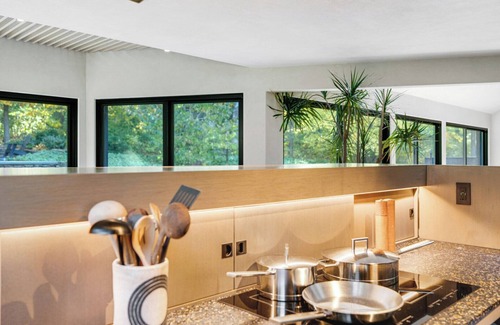 Tuckahoe House | Beautifully Designed and Modern Southampton Home Surrounded by Nature,.