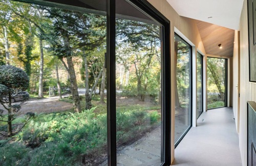 Tuckahoe House | Beautifully Designed and Modern Southampton Home Surrounded by Nature,.