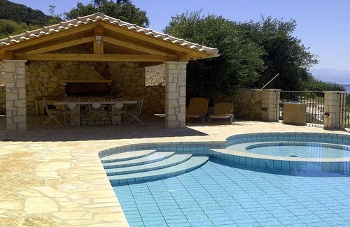 Barbati Villa | Beautifully Restored Olive Press, Private Pool, Jacuzzi, Stunning Sea Views 5 mins to Nissaki Resort