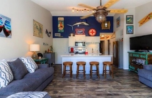 Lake Ozark Condo | BEAUTIFULLY UPDATED LAKEFRONT CONDO & OVERSIZED DECK, WI-FI, 2 Pools, hot tub.
