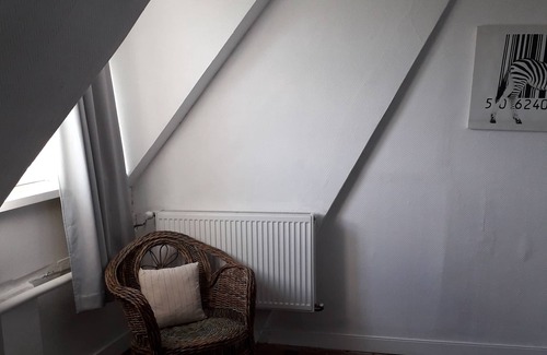 Cintray Apartment | Bedrooms upstairs in a farmhouse