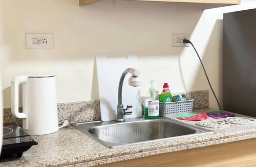 Kapitolyo Condo | BGC view, Big Pools , Gym, Picnic Area, 100 MBPS Internet