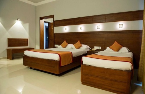 Guruvayur Hotel | Bhasuri Inn Guruvayoor