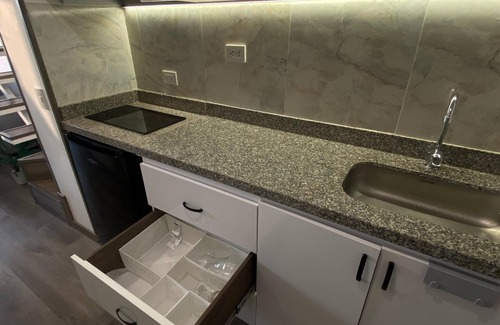 Barrios Unidos Apartment | Blessing House: Modern retreat with balcony, close to everything in Bogota.