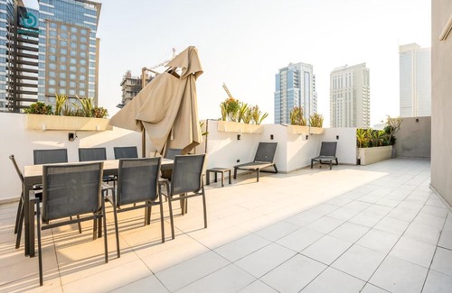 Jumeirah Village Circle Apartment | Blue Breeze - Elegant 1BR with Private Jacuzzi & Terrace in JVC