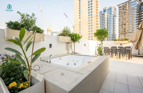 Jumeirah Village Circle Apartment | Blue Breeze - Elegant 1BR with Private Jacuzzi & Terrace in JVC