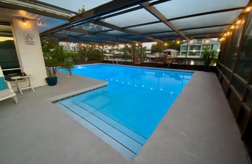 Ruskin House | Blue Heron House, Private 4 BR Waterfront w Heated Pool and Fire Pit