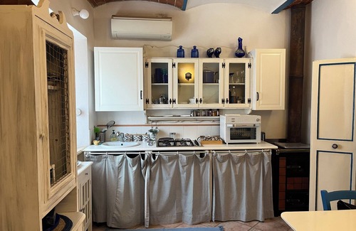 Porto Ercole Apartment | BLUE HOUSE. Characteristic romantic bilevel period property in the center of Porto Ercole