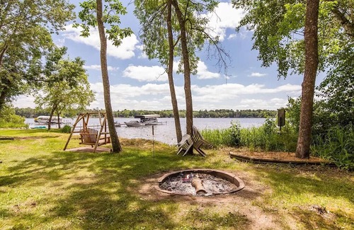 Breezy Point Cabin | Blue Ox Barn: a cozy Minnesota lakehouse with private beach and incredible views