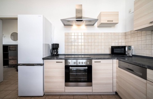 Muritz Apartment | Blue Sea vacation apartment in the heart of Malchow with lake view and fireplace