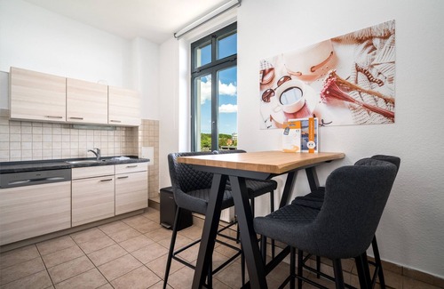 Muritz Apartment | Blue Sea vacation apartment in the heart of Malchow with lake view and fireplace
