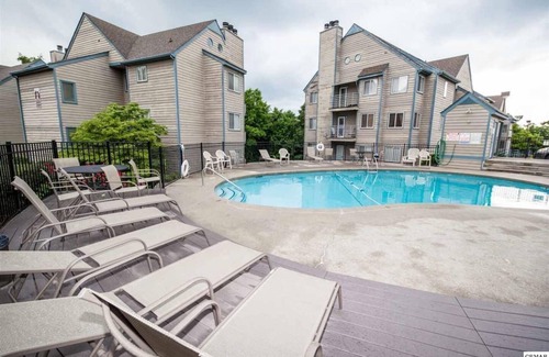 Chalet Village Condo | Blue Smoke Vistas - 2BR Condo for 4 facing park w/pools