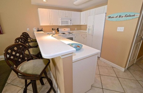 Gulf Shores Condo | Boat Slip - Pool- Screened balcony- Water front. 30 DAY MINIMUM STAY.