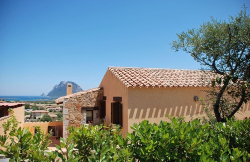 Porto San Paolo Apartment | Bouganville apartment on villa with garden facing Tavolara Island