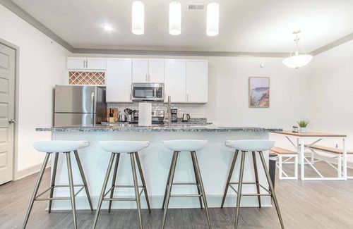 Buechel Apartment | Boulevard Stays Stylish 3BR Getaway Pool, Gym Access & Free Parking