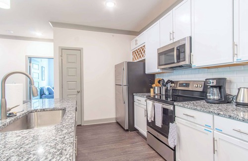 Buechel Apartment | Boulevard Stays Stylish 3BR Getaway Pool, Gym Access & Free Parking
