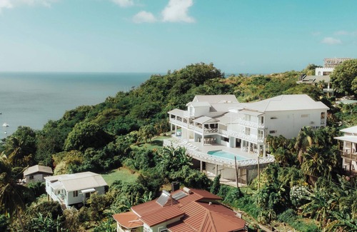 St. George's House | Boutique Villa with 15 bedrooms, pool, veranda, WiFi, AC and serene views